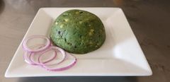 Mukimo "kienyeji" served with ringed shallots