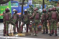 Anti riot police officers patrol the streets on Nairobi