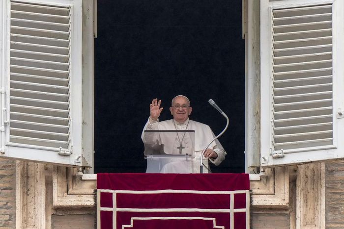 Pope Francis delivers his blessing from the window of his studio overlooking St. Peter's Square at the Vatican on January 7, 2024.Andrew Medichini/AP