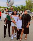 Samidoh Edday Nderitu and their family during their daughter's graduation in the U.S