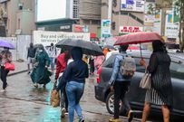 People walking in the rain