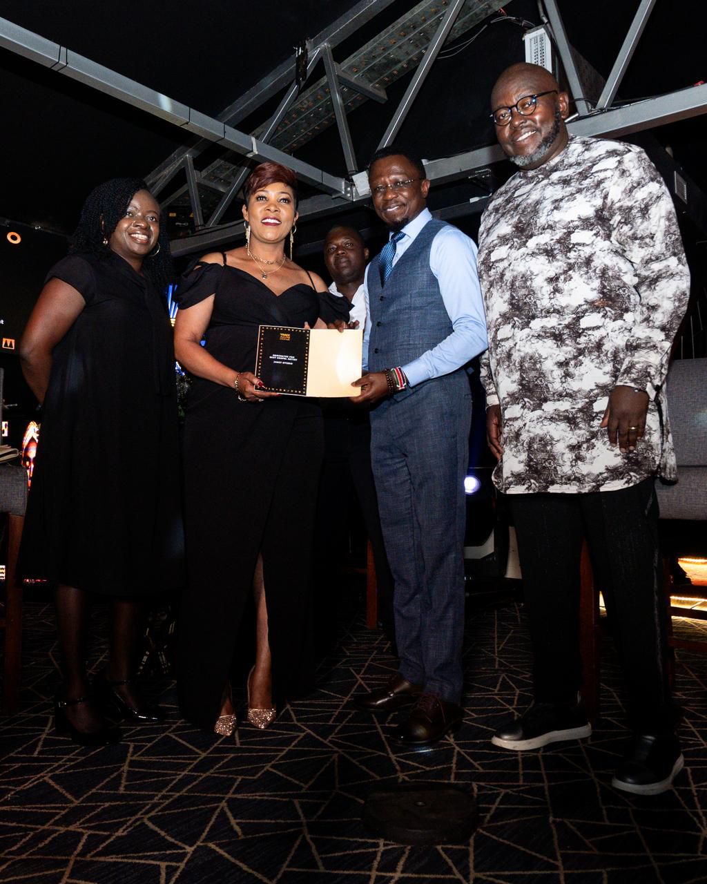 From left to right Esther Muhoro head of marketing Pernod Ricard, Trace award nominee Janet Otieno, CS Ababu Namwamba and Trace EA MD Danny Mucira