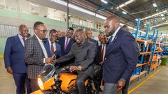 President William Ruto takes a test drive on an electric motorcycle during a visit to Roam Park, an electric motorcycle assembly plant in Industrial Area, Nairobi, July 25, 2023