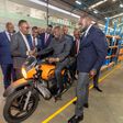 President William Ruto takes a test drive on an electric motorcycle during a visit to Roam Park, an electric motorcycle assembly plant in Industrial Area, Nairobi, July 25, 2023