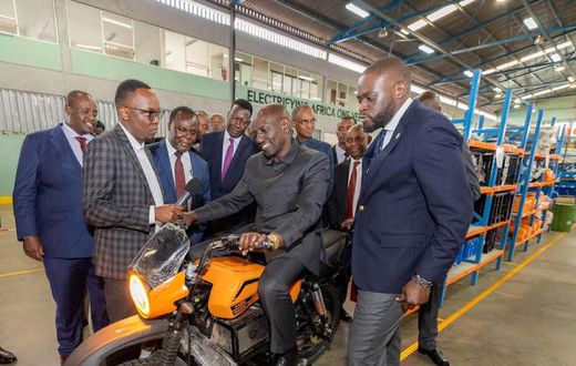 President William Ruto takes a test drive on an electric motorcycle during a visit to Roam Park, an electric motorcycle assembly plant in Industrial Area, Nairobi, July 25, 2023