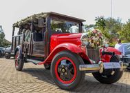 A classic red 1930 Ford V8 Safari Wagon at Kipchumba Karori
