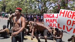 Eric Omondi leads protests outside parliament buildings