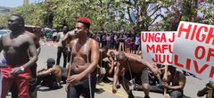 Eric Omondi leads protests outside parliament buildings