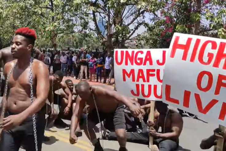 Eric Omondi leads protests outside parliament buildings