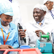 President William Ruto is shown how the smart phones are made at the East Africa Device Assembly Kenya factory in Athi River, Machakos during its launch on October 30, 2023.