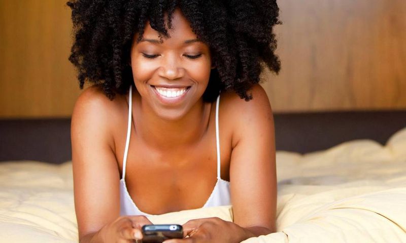 Woman texting(blackcitygirl)