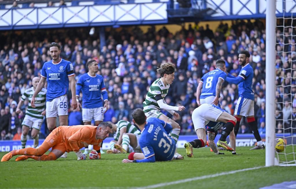 Glasgow, Scotland, 2nd January 2023. Kyogo Furuhashi of Celtic scores a late equaliser during the cinch Premiership match at Ibrox Stadium, Glasgow.