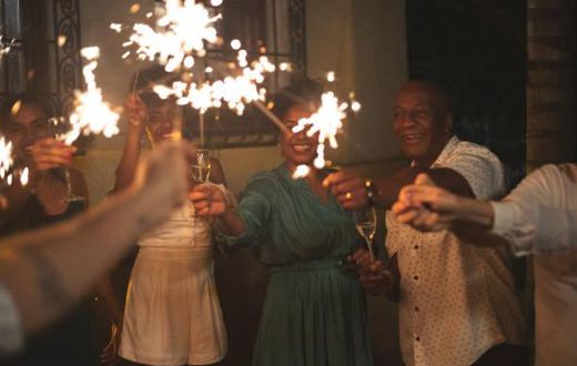 Family and friends celebrating New Year's eve party at home
