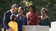 President Barack Obama (from left), his daughters Sasha and Malia, first lady Michelle Obama and Marian Robinson, Michelle Obama’s mother, at the Martin Luther King Jr. National Memorial on the National Mall in Washington in 2011.Carolyn Kaster/AP