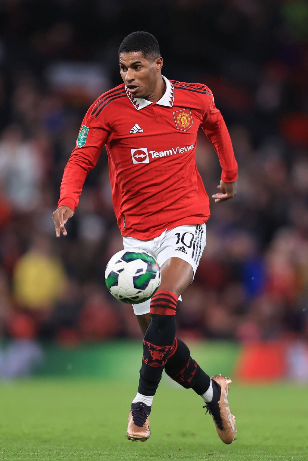 Marcus Rashford of Manchester United controls the ball in a Carabao match against Charlton on January 10, 2023.