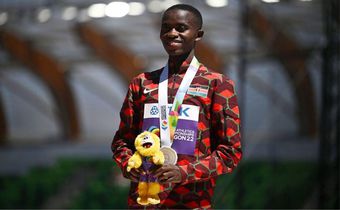 Silver medallist Kenya's Stanley Waithaka Mburu poses on the podium during the medal ceremony for the men's 10,000m during the World Athletics Championships at Hayward Field in Eugene, Oregon on July 17, 2022. (Photo by BEN STANSALL/AFP via Getty Image...