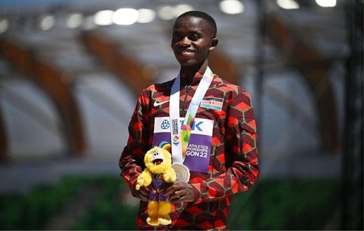 Silver medallist Kenya's Stanley Waithaka Mburu poses on the podium during the medal ceremony for the men's 10,000m during the World Athletics Championships at Hayward Field in Eugene, Oregon on July 17, 2022. (Photo by BEN STANSALL/AFP via Getty Image...