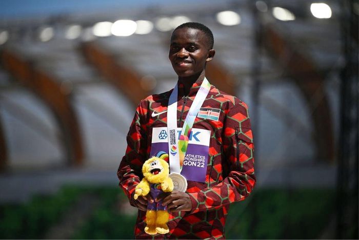 Silver medallist Kenya's Stanley Waithaka Mburu poses on the podium during the medal ceremony for the men's 10,000m during the World Athletics Championships at Hayward Field in Eugene, Oregon on July 17, 2022. (Photo by BEN STANSALL/AFP via Getty Image...