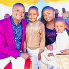 Molo MP Kimani Kuria with his wife and two children