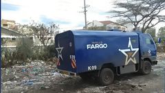 A Wells Fargo cash-in-transit vehicle abandoned along the Southern Bypass