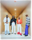 Members of Sauti Sol pose for a group photo