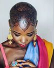 Lupita Nyong'o adorns intricate henna design