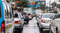 Heavy traffic on a Kenyan road during the rainy season
