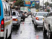 Heavy traffic on a Kenyan road during the rainy season