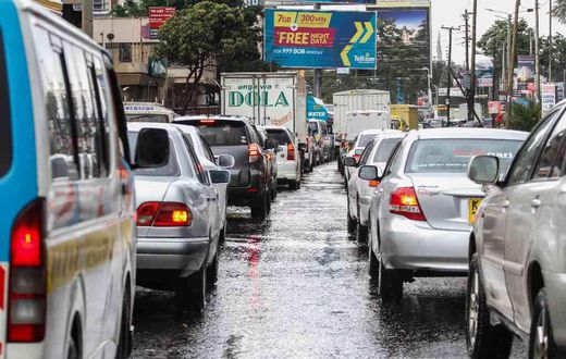 Heavy traffic on a Kenyan road during the rainy season