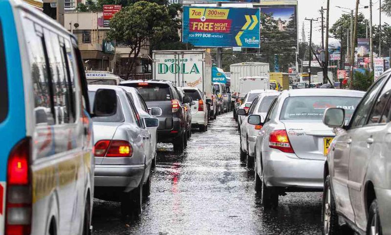 Heavy traffic on a Kenyan road during the rainy season