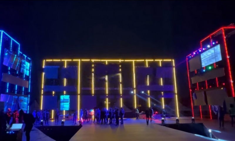 The massive stage, the size of a two-story building, is where everything is going down.