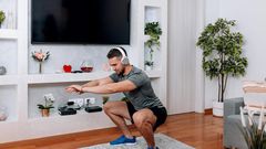 Taking a break for a quick set of squats during the work day may help you stay focused, according to science. Maybe don't try it during a meeting, though.RealPeopleGroup/Getty Images