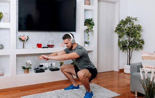 Taking a break for a quick set of squats during the work day may help you stay focused, according to science. Maybe don't try it during a meeting, though.RealPeopleGroup/Getty Images
