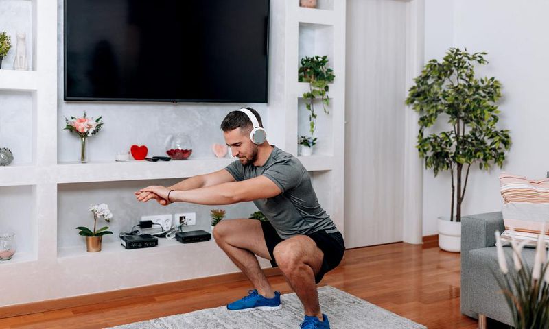 Taking a break for a quick set of squats during the work day may help you stay focused, according to science. Maybe don't try it during a meeting, though.RealPeopleGroup/Getty Images
