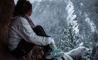 Lady observing snow