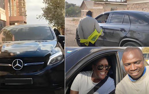 Winnie Odinga takes a photo with a boda boda rider