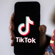 A collage of a phone showing the Tiktok app and Speaker Moses Wetangula