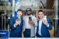 From Left- TECNO Country Manager, Ray Fang, CAMON 20 Brand Ambassador, Nyashinki and TECNO Brand Manager, Peter Shi during the official opening of the new TECNO Exclusive Store at the Garden City Mall in Naior