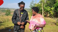 Rex Masai with his mother