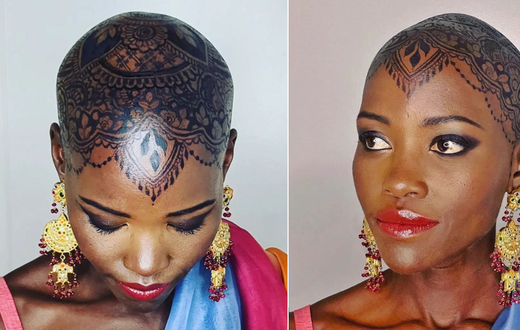 Lupita Nyong'o dorns intricate henna design on her bald head
