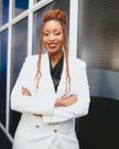Janet Mbugua poses for photo
