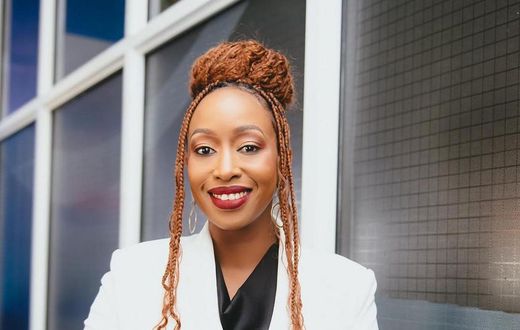 Janet Mbugua poses for photo