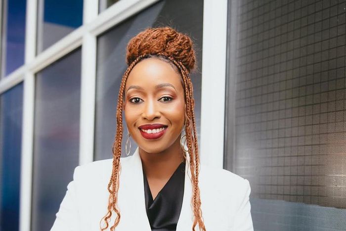 Janet Mbugua poses for photo