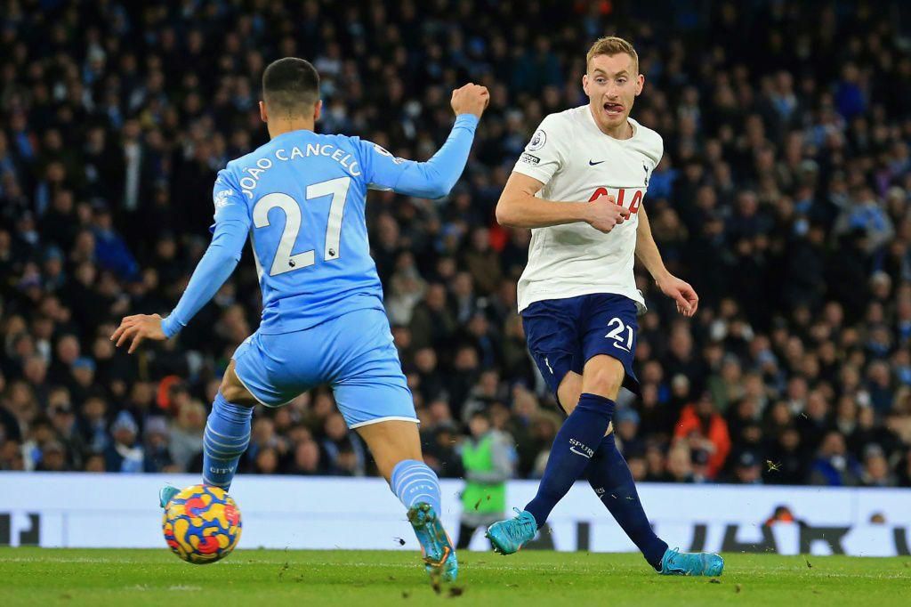 Dejan Kulusevski (right) shoots past Joao Cancelo to score