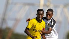 Wazito FC Elli Asieche (left) shields Tusker FC Charles Momanyi on March 8, 2022 during Kenya Premier League match played at Moi International Sportes Centre
