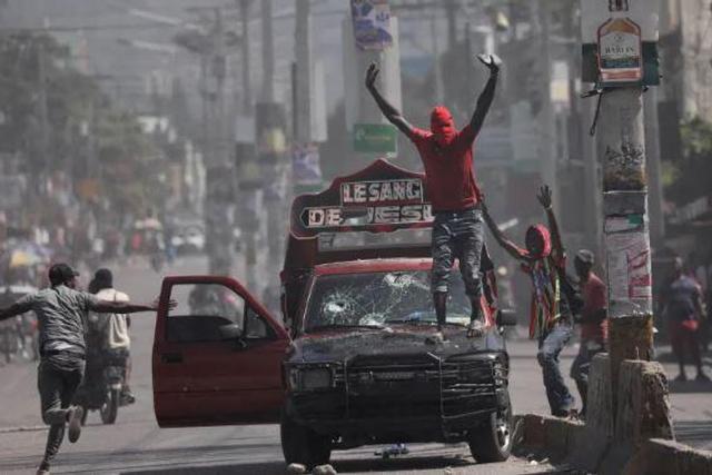 Violence rocked the streets of Haiti's Capital Port-Au-Prince with armed gangs taking on the police