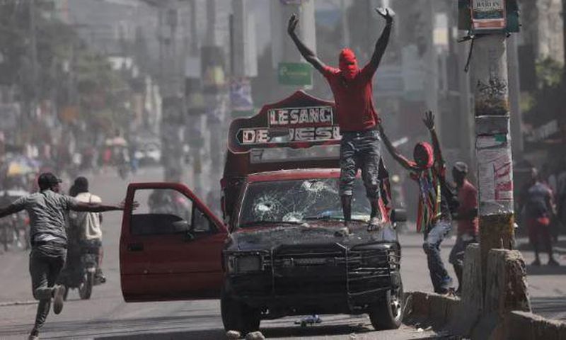 Violence rocked the streets of Haiti's Capital Port-Au-Prince with armed gangs taking on the police