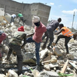 File image of people digging through the rubble to salvage what they can after demolitions in Nairobi