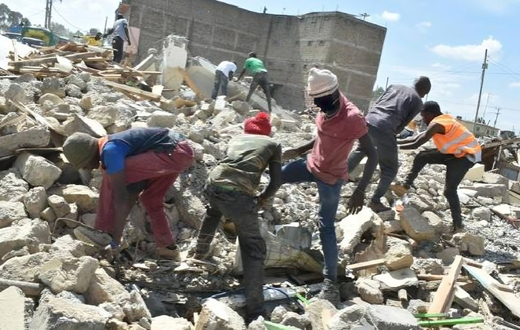 File image of people digging through the rubble to salvage what they can after demolitions in Nairobi