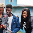 Young people having fun and using technology